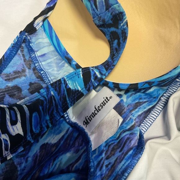 Miraclesuit Blue One Piece Swimsuit with V-Neckline and Ruched Bodice - Picture 11 of 15